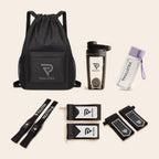 Coffret musculation noir Pullstra 6 pièces : sac de sport 30 L, shaker, bouteille, sangles de tirage et deux paires de bandes de poignet